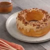 Rosca de pan suave rellena y decorada con dulce de leche de Pastelería Aranzazu en CDMX